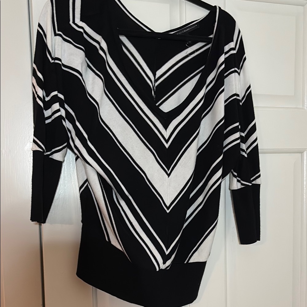 Black and White V-Neck Sweater with Chevron Pattern